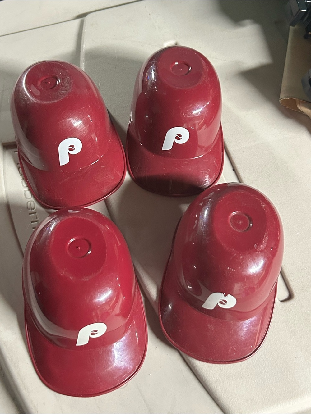 Mini Phillies helmets